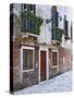 Residential Side Street Decorated with Flowers, Venice, Italy-Dennis Flaherty-Stretched Canvas