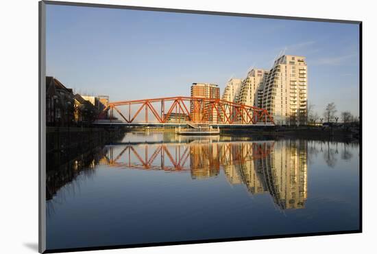 Residential Tower Blocks and Colourful Bridge Reflected in Water, Salford Quays, Salford-Ruth Tomlinson-Mounted Photographic Print