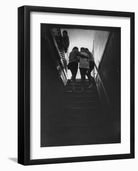 Residents Escorting a Newly Arriving Drug Addict at Synanon House for Rehabilitation-null-Framed Photographic Print