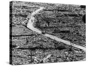 Residents Moving Through Rubble of Nagasaki Shortly After Atomic Bomb Was Dropped-null-Stretched Canvas