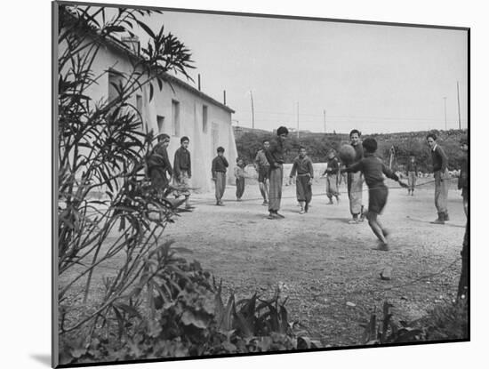 Residents of Italian Boystown Playing Soccer-null-Mounted Photographic Print