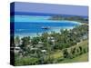 Resort Huts Beside Coral Sand Beach, Fiji, South Pacific Islands-Anthony Waltham-Stretched Canvas