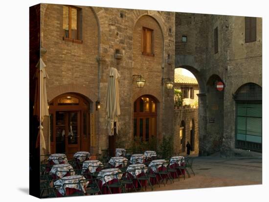 Restaurant in a Small Piazza, San Gimignano, Tuscany, Italy-Janis Miglavs-Stretched Canvas