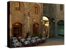 Restaurant in a Small Piazza, San Gimignano, Tuscany, Italy-Janis Miglavs-Stretched Canvas