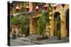 Restaurants and lanterns, Hoi An, Vietnam-David Wall-Stretched Canvas