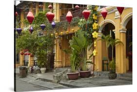 Restaurants and lanterns, Hoi An, Vietnam-David Wall-Stretched Canvas