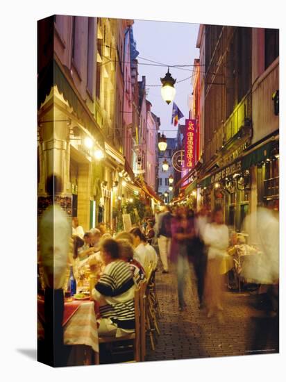 Restaurants in the Rue Des Bouchers, Brussels, Beljium-Nigel Francis-Stretched Canvas