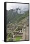 Restoration work at the Inca ruins of Machu Picchu, UNESCO World Heritage Site, Peru, South America-Julio Etchart-Framed Stretched Canvas