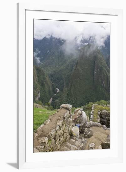 Restoration work at the Inca ruins of Machu Picchu, UNESCO World Heritage Site, Peru, South America-Julio Etchart-Framed Photographic Print