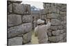 Restoration work at the Inca ruins of Machu Picchu, UNESCO World Heritage Site, Peru, South America-Julio Etchart-Stretched Canvas