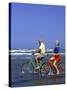 Retired Couple Riding Bikes at the Beach-Bill Bachmann-Stretched Canvas