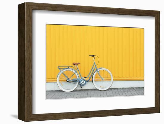 Retro Bicycle near Yellow Wall Outdoors-Africa Studio-Framed Photographic Print