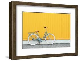 Retro Bicycle near Yellow Wall Outdoors-Africa Studio-Framed Photographic Print