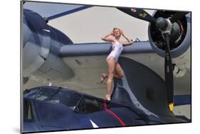 Retro Pin-Up Girl Posing with a World War II Era Pby Catalina Seaplane-null-Mounted Photographic Print
