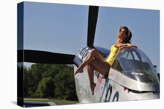 Retro Pin-Up Girl Sitting Outside the Cockpit of a P-51 Mustang-null-Stretched Canvas