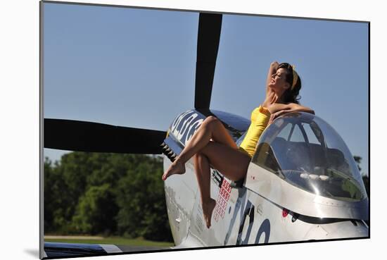 Retro Pin-Up Girl Sitting Outside the Cockpit of a P-51 Mustang-null-Mounted Photographic Print