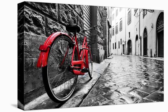 Retro Vintage Red Bike on Cobblestone Street in the Old Town. Color in Black and White. Old Charmin-Michal Bednarek-Stretched Canvas