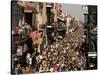 Revelers Pack the French Quarter's Famous Bourbon Street During the Annual Mardi Gras Celebration-null-Stretched Canvas