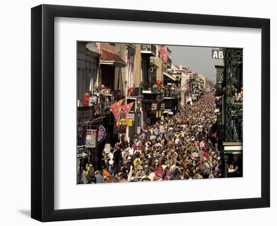 Revelers Pack the French Quarter's Famous Bourbon Street During the Annual Mardi Gras Celebration-null-Framed Photographic Print