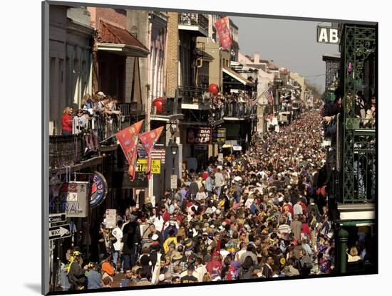 Revelers Pack the French Quarter's Famous Bourbon Street During the Annual Mardi Gras Celebration-null-Mounted Photographic Print