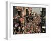 Revelers Pack the French Quarter's Famous Bourbon Street During the Annual Mardi Gras Celebration-null-Framed Photographic Print