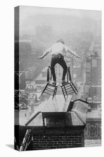 Reynolds Performs a Balancing Act on Roof in New York City-null-Stretched Canvas