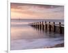 RF - Groyne/sea defense at Dawlish Warren at dawn, South Devon, UK-Ross Hoddinott-Framed Photographic Print