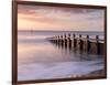 RF - Groyne/sea defense at Dawlish Warren at dawn, South Devon, UK-Ross Hoddinott-Framed Photographic Print