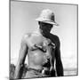 Rhesus Monkey Climbing on a Man's Chest at a Monkey Colony-Hansel Mieth-Mounted Premium Photographic Print