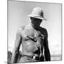 Rhesus Monkey Climbing on a Man's Chest at a Monkey Colony-Hansel Mieth-Mounted Premium Photographic Print