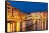 Rialto Bridge (Ponte di Rialto) at night with boat light trails on the Grand Canal, Venice, Veneto-Neale Clark-Framed Stretched Canvas