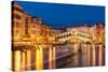 Rialto Bridge (Ponte di Rialto) at night with boat light trails on the Grand Canal, Venice, Veneto-Neale Clark-Stretched Canvas