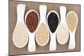 Rice Grain Selection In White Porcelain Scoops Over Hessian Background-marilyna-Mounted Art Print