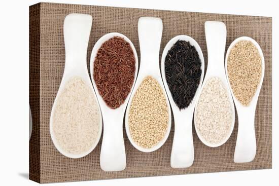 Rice Grain Selection In White Porcelain Scoops Over Hessian Background-marilyna-Stretched Canvas