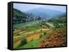 Rice Paddies and Brick-Maker at Longsheng in Northeast Guangxi Province, China-Robert Francis-Framed Stretched Canvas