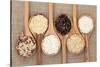 Rice Varieties In Olive Wood Spoons Over Hessian Background-marilyna-Stretched Canvas