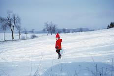 Germany - Bielefeld - 1960's Child Plays in Snow-Richard Baker-Framed Photographic Print