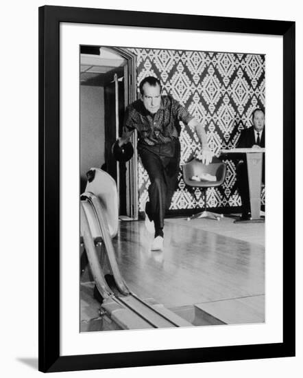 Richard Nixon Bowling at the White House Bowling Alley, 1970-null-Framed Photo