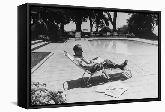 Richard Nixon Reading Newspapers While Sitting by the Pool in San Clemente, Ca. 1969-74-null-Framed Stretched Canvas