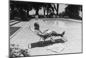 Richard Nixon Reading Newspapers While Sitting by the Pool in San Clemente, Ca. 1969-74-null-Mounted Photo