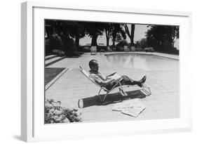 Richard Nixon Reading Newspapers While Sitting by the Pool in San Clemente, Ca. 1969-74-null-Framed Photo