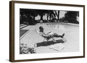 Richard Nixon Reading Newspapers While Sitting by the Pool in San Clemente, Ca. 1969-74-null-Framed Photo