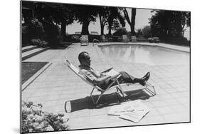 Richard Nixon Reading Newspapers While Sitting by the Pool in San Clemente, Ca. 1969-74-null-Mounted Photo