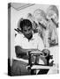 Richard 'Pancho' Gonzales Restringing a Tennis Racket in 1962-null-Stretched Canvas