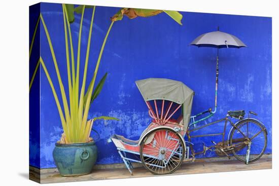 Rickshaw in Cheong Fatt Tze Mansion, Georgetown, Penang Island, Malaysia, Southeast Asia, Asia-Richard Cummins-Stretched Canvas