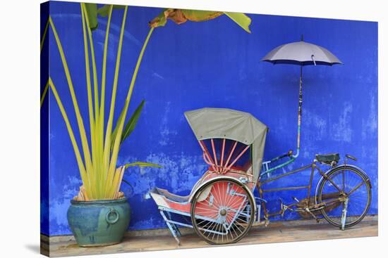 Rickshaw in Cheong Fatt Tze Mansion, Georgetown, Penang Island, Malaysia, Southeast Asia, Asia-Richard Cummins-Stretched Canvas