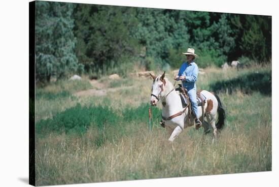 Rider at Bishop's Lodge in Santa Fe, New Mexico, USA-null-Stretched Canvas