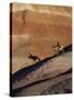 Rider with Shadow Coming down Hill in Painted Desert-Terry Eggers-Stretched Canvas