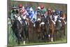 Riders and Racehorses Galloping around Racecourse-null-Mounted Photographic Print