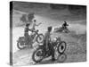 Riders Enjoying Motorcycle Riding, with One Taking a Spill-Loomis Dean-Stretched Canvas